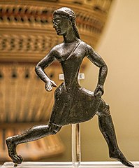 image of bronze figure of Spartan running girl