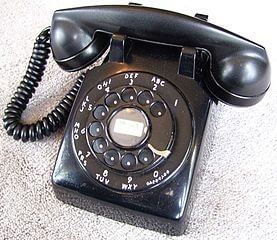 image of black rotary dial telephone