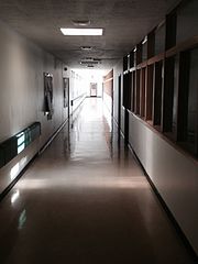 Photo of dark school hallway