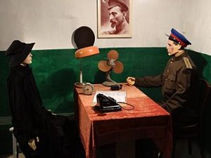 image of diorama of soviet interrogation of woman