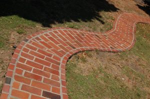 photo of curved brick path