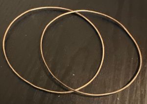 Photo of two gold bracelets