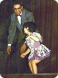 Photo of me with the late, great Al Gilbert, performing in my first dance recital at age three. This, after the experts said I would be deaf, dumb, blind, and completely paralyzed.